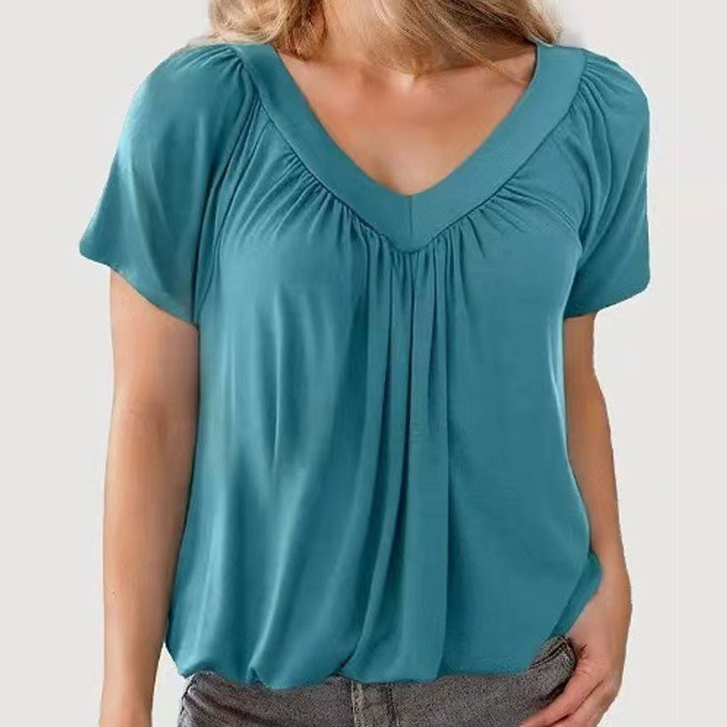 Casual damesblouse met plooien, V-hals en korte mouwen.