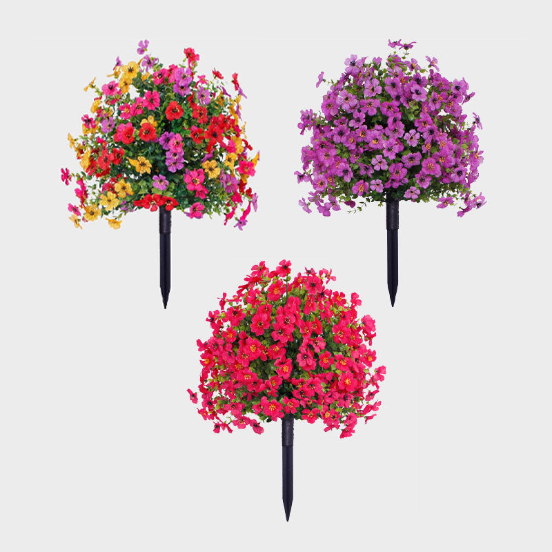 Bloemdecoratie met kunstmatige eucalyptus en viooltjes voor in de gron