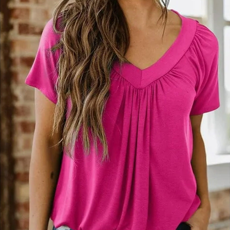 Casual damesblouse met plooien, V-hals en korte mouwen.