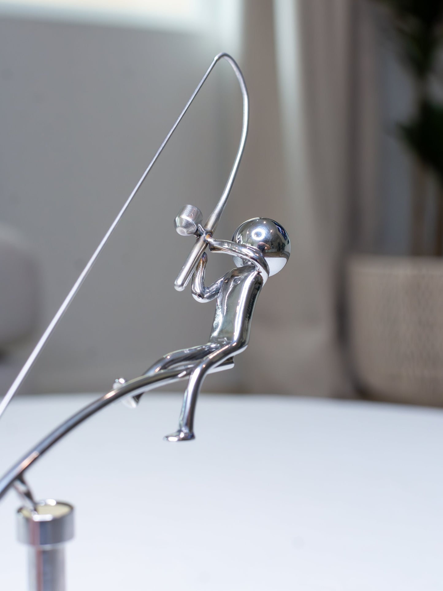🎣De visser die het beeld balanceert