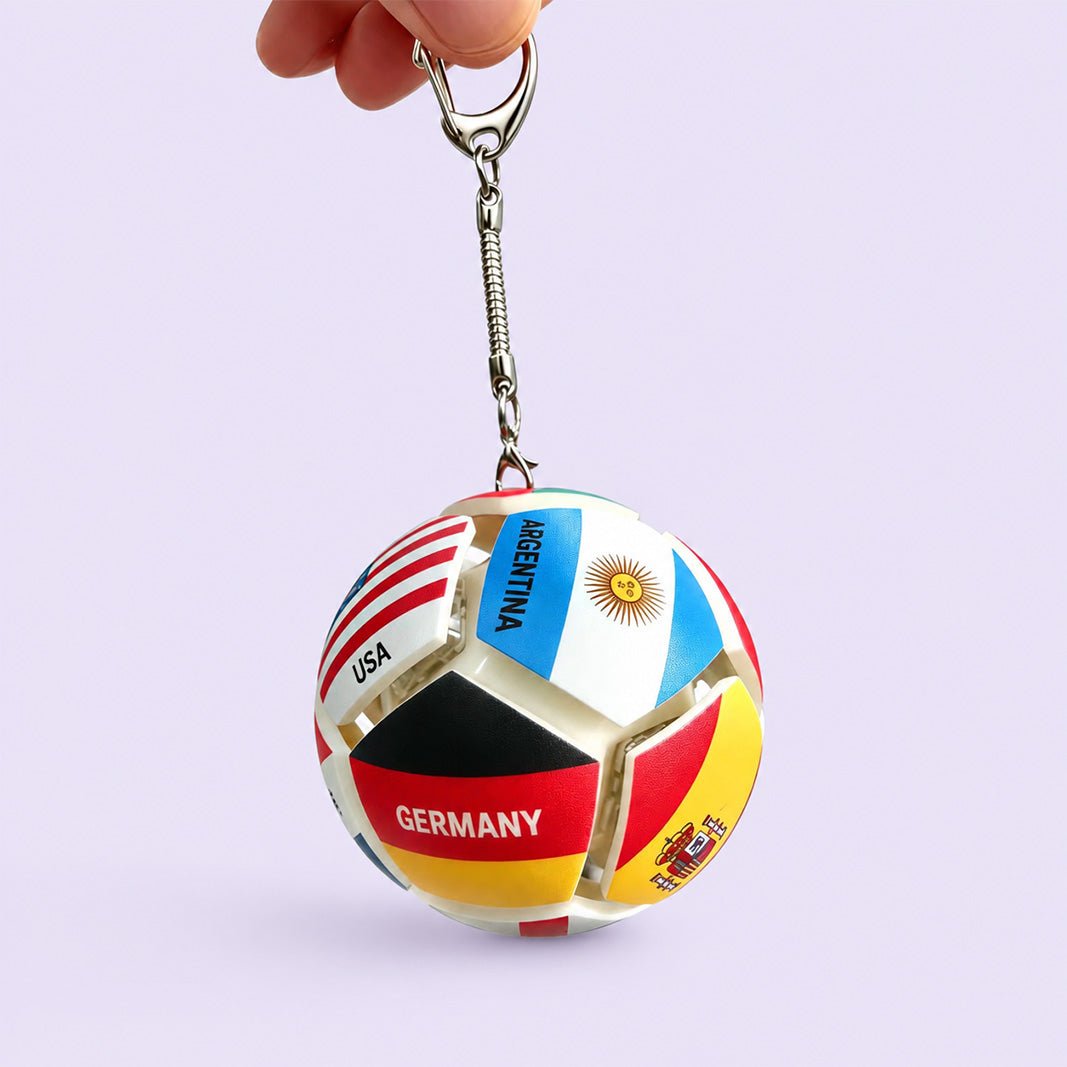 🏆⚽ Officieel gelicentieerde sleutelhanger met wereldvlag en voetbalmotief | Stressverlichtend speeltje voor in je zak