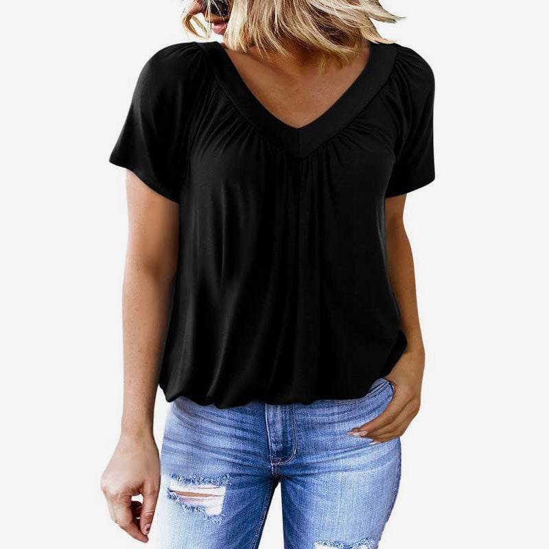 Casual damesblouse met plooien, V-hals en korte mouwen.